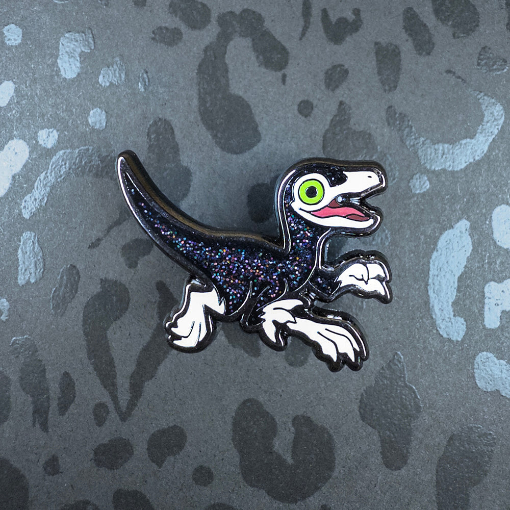Jurassic Attack! Black Sparkle Compsognathus Enamel Pin - Versiris - Art by Versiris